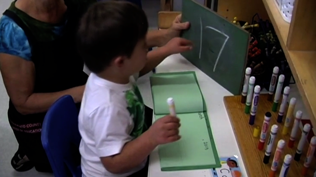 Cody Writing and Drawing